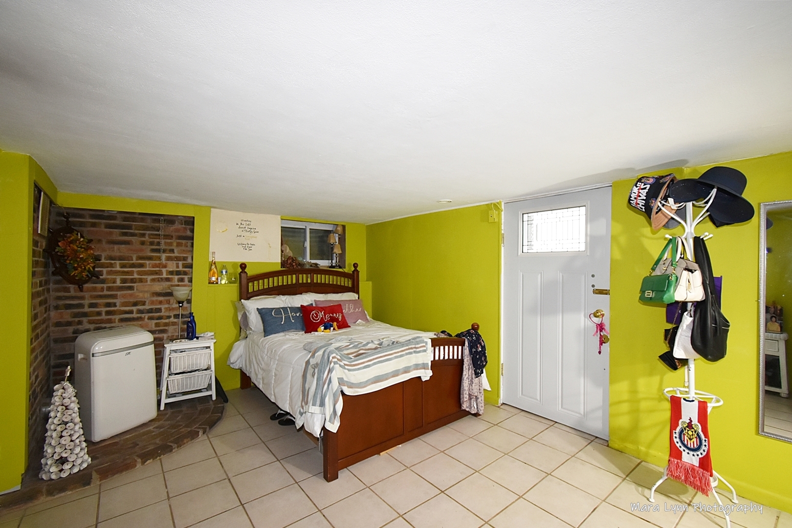 302 Division Street Geneva, IL 60134 - Photo 22 of 25 a bedroom with a bed and ceiling fan