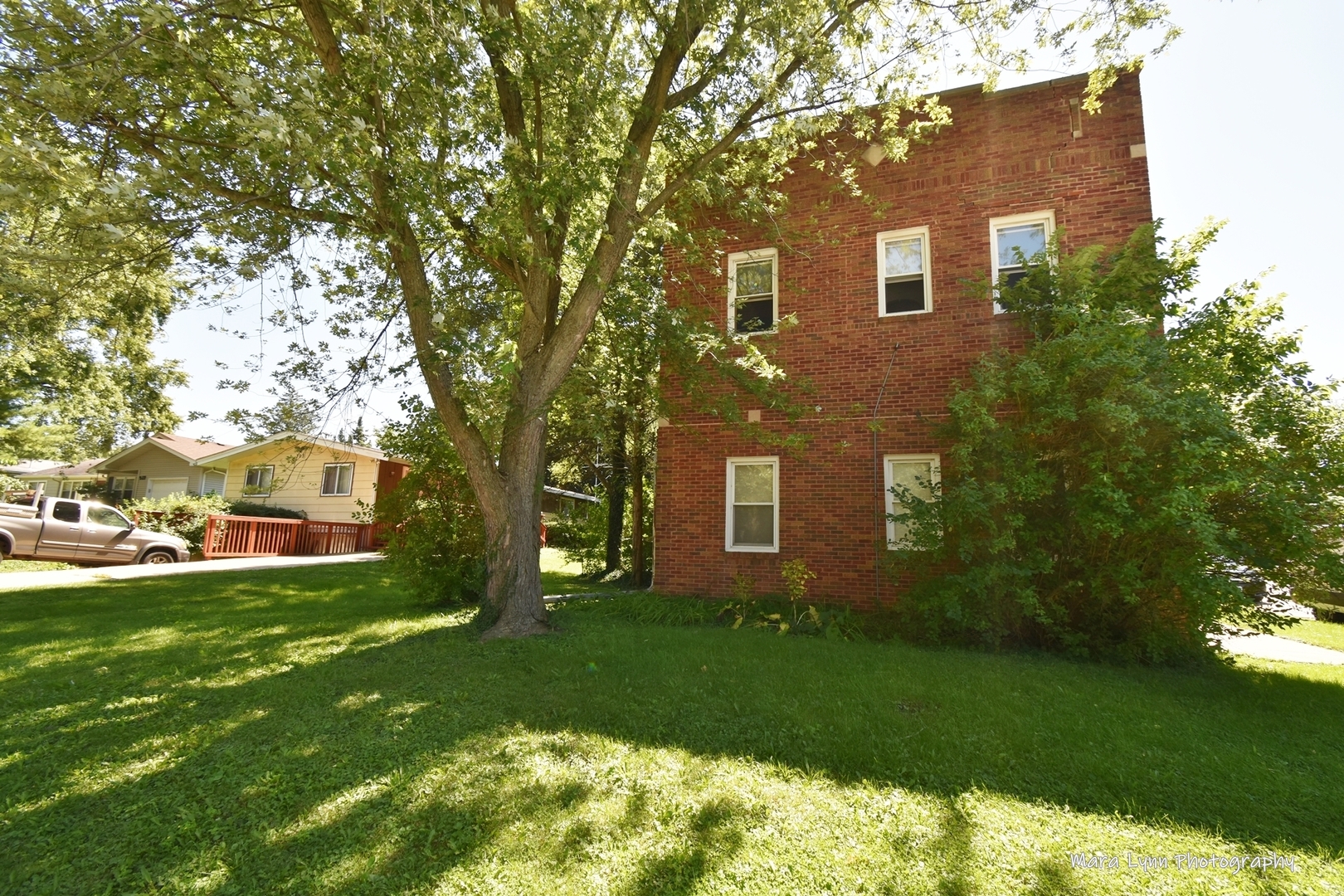 302 Division Street Geneva, IL 60134 - Photo 4 of 25 a view of a house with a yard