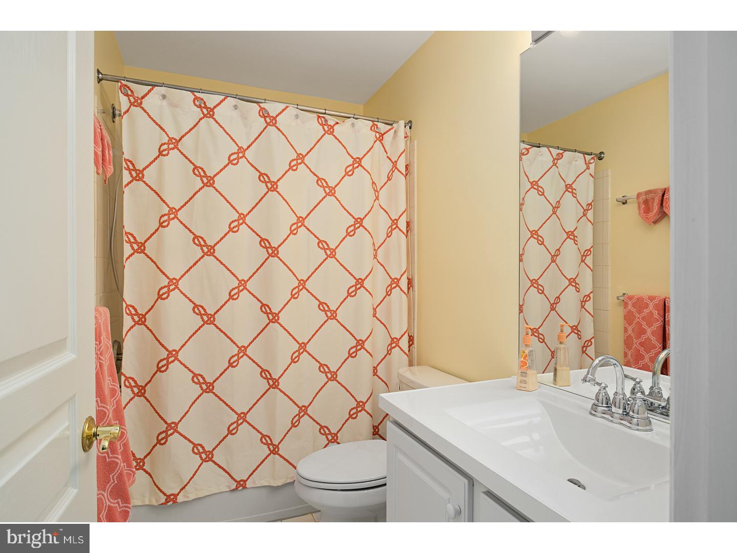 30 Emery Way Delanco, NJ 08075 - Photo 22 of 25 a bathroom with a sink and a mirror