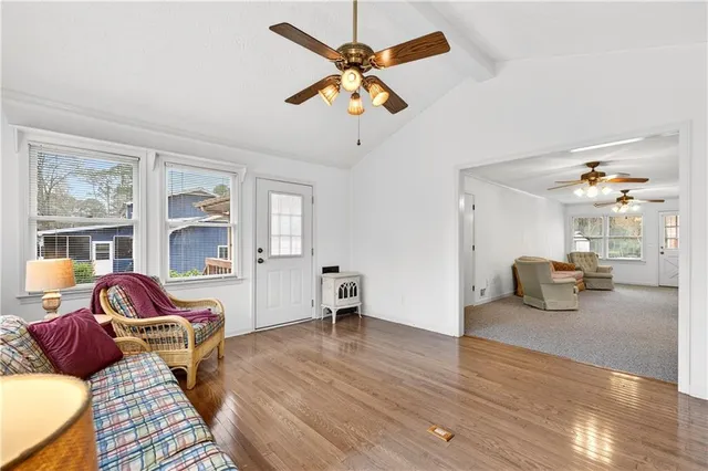 an aerial view of residential houses with outdoor space