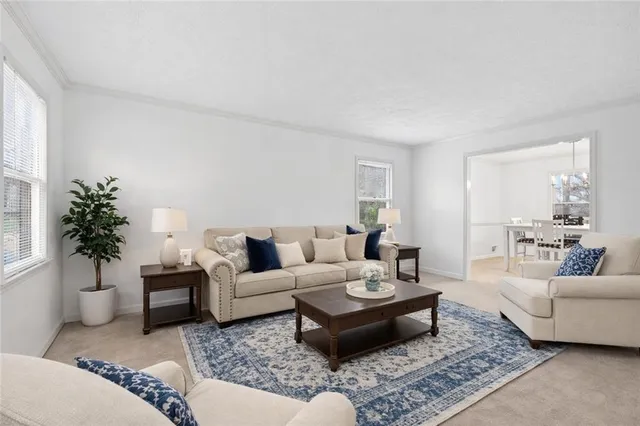 a living room with furniture and a couch