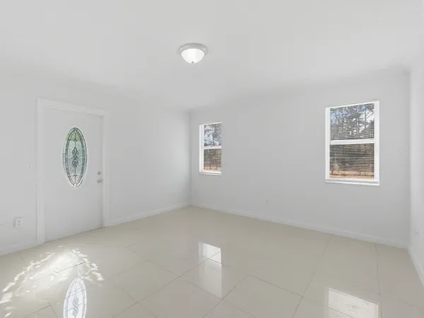 an empty room with windows