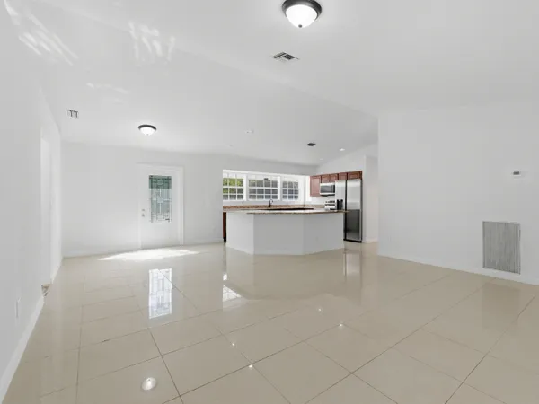 a view of kitchen and windows