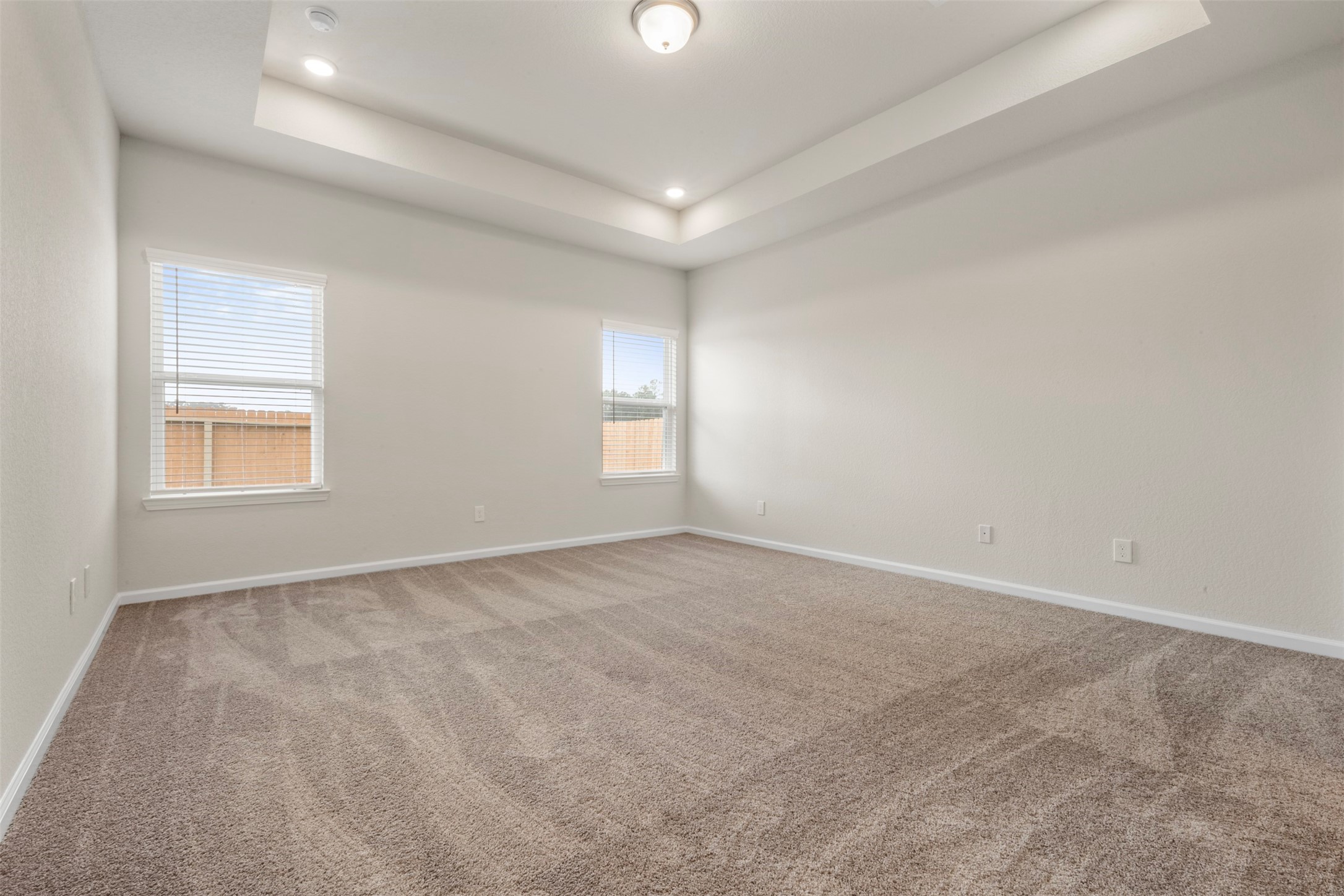 10249 Badger Run Lane Magnolia, TX 77354 - Photo 16 of 36 an empty room with windows and closet