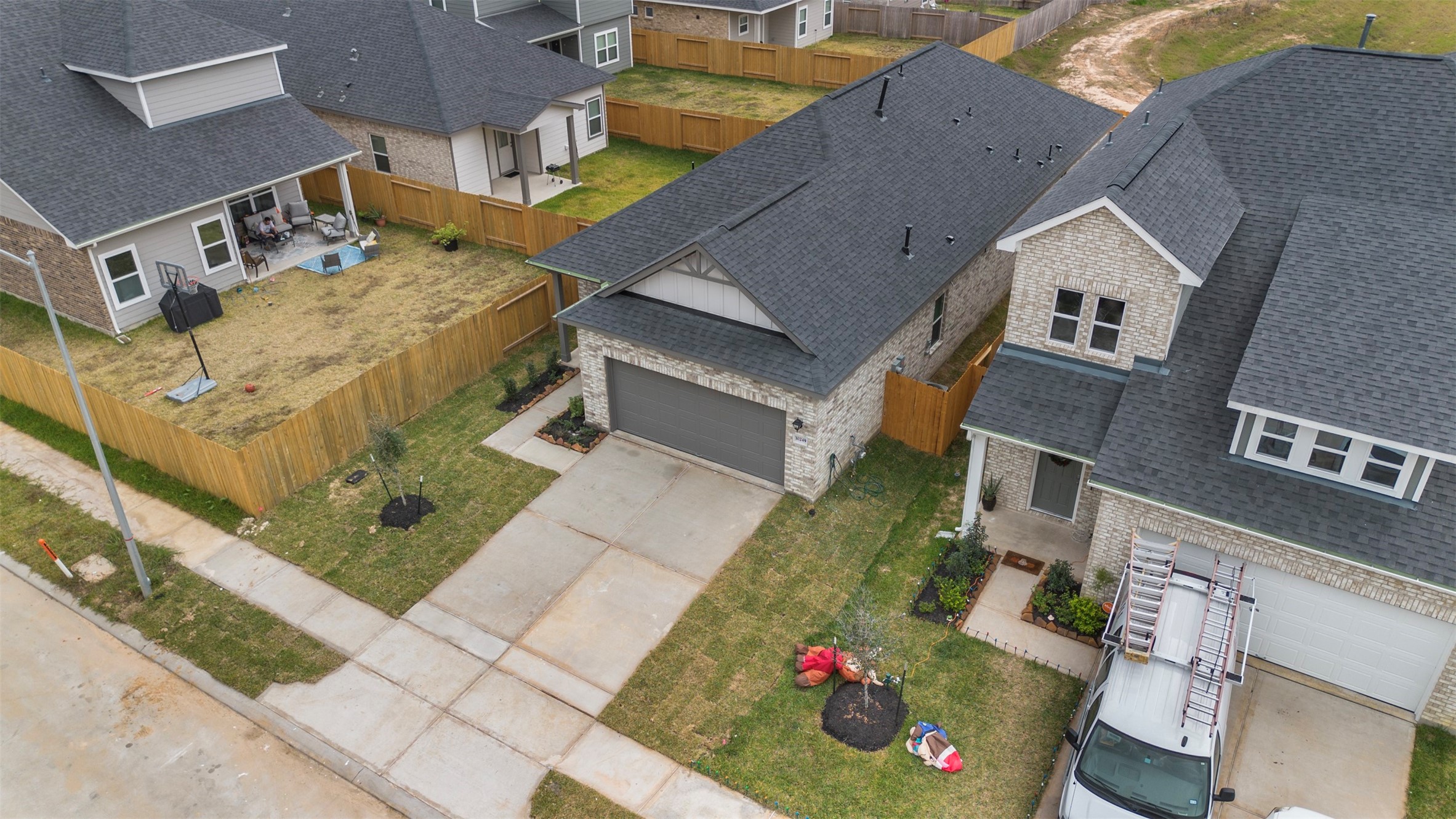 10249 Badger Run Lane Magnolia, TX 77354 - Photo 31 of 36 a aerial view of a house with a yard