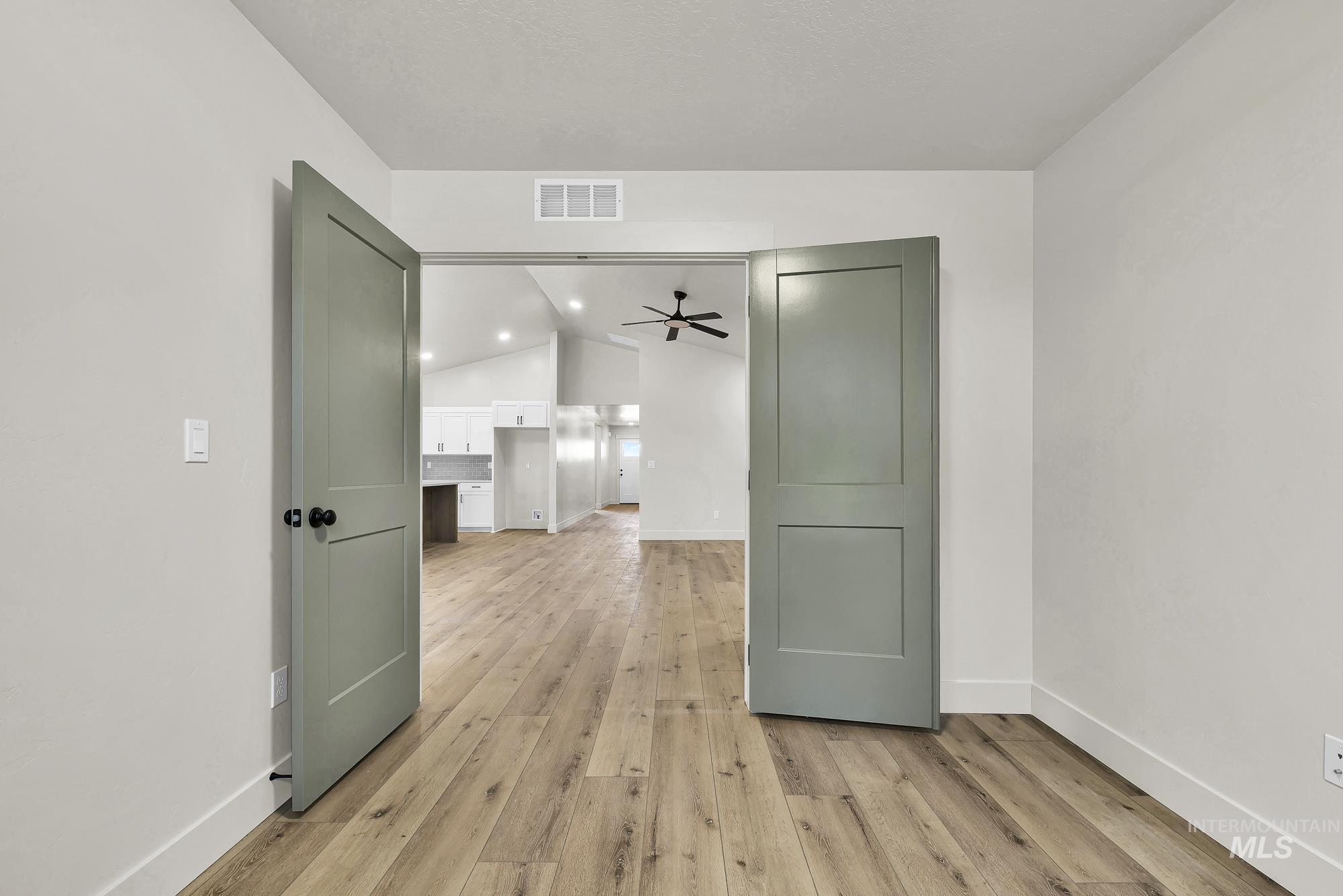 1130 Velvet Loop Wilder, ID 83676 - Photo 17 of 35 Entryway featuring wood-finish flooring, light gray walls, and white baseboards