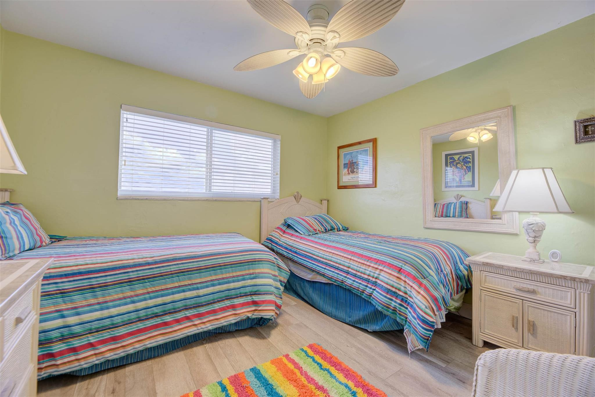 1815 North Surf Road, Unit 403 Hollywood, FL 33019 - Photo 14 of 28 a bedroom with a bed and a chandelier