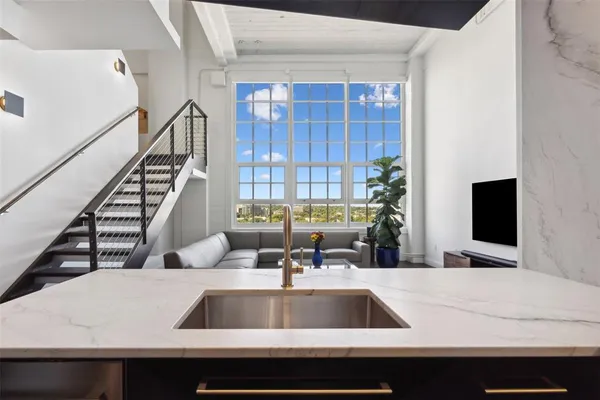 a view of kitchen sink and natural light