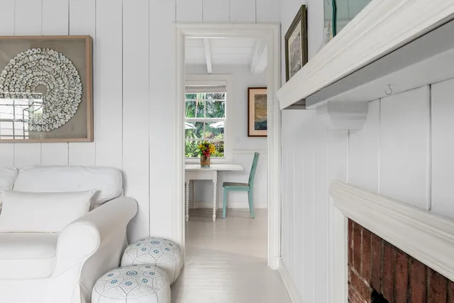 a kitchen with stainless steel appliances kitchen island granite countertop a refrigerator and a sink