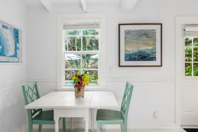a kitchen with a sink stove and microwave