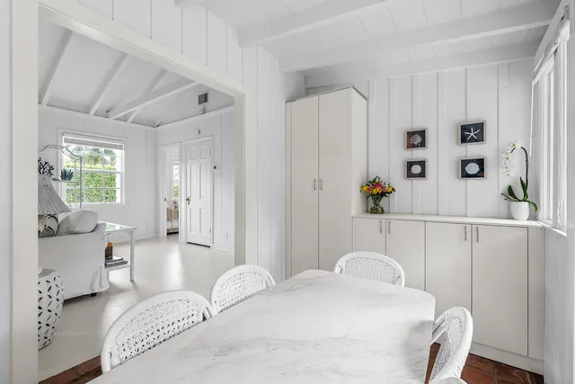 a bathroom with a bathtub and a sink