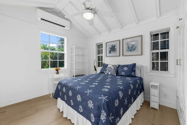 a view of a backyard with plants and patio