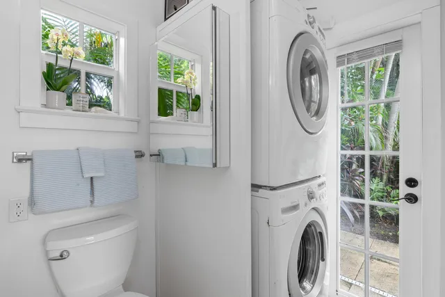 a view of a fountain in the backyard of house