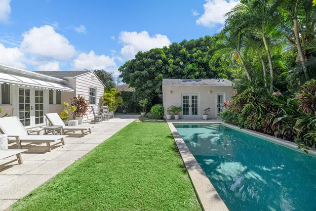 a backyard of a house with lots of green space