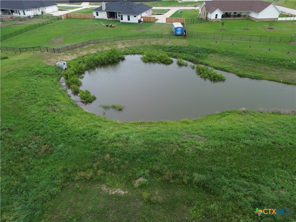 996 Inka Road Salado, TX 76571 - Photo 2 of 8 a view of a lake from a yard