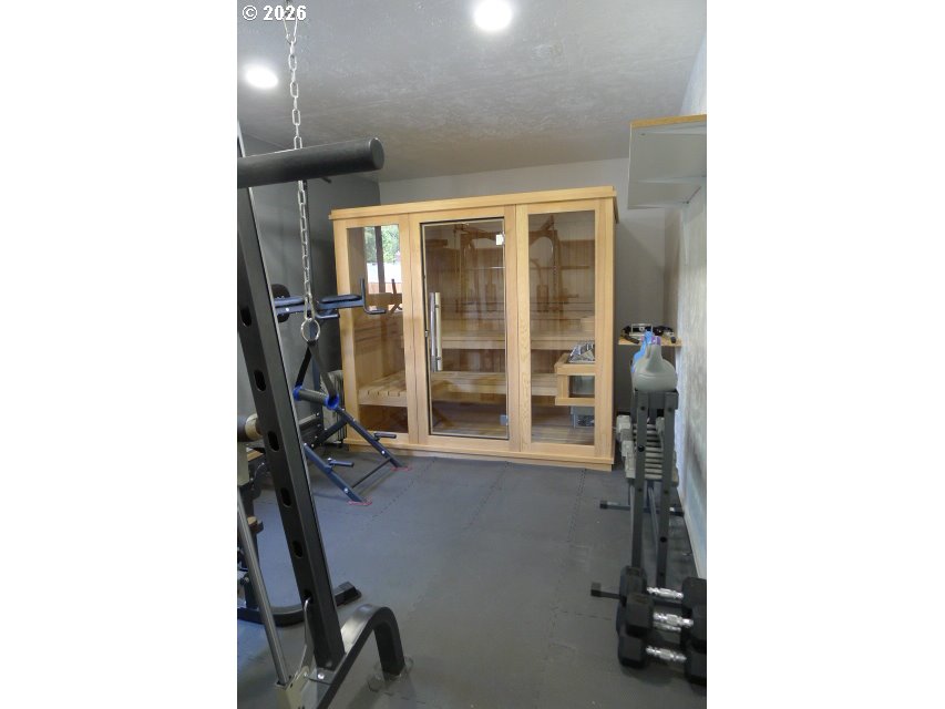 412 Camellia Court Reedsport, OR 97467 - Photo 13 of 48 a view of storage and utility room with windows