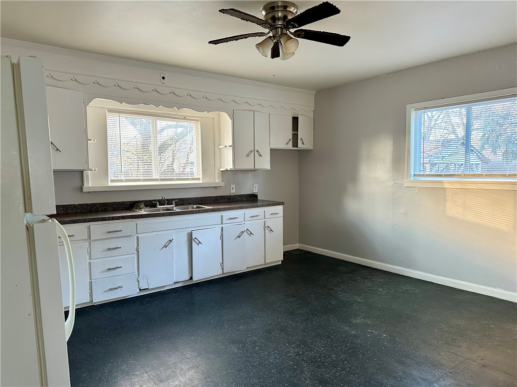61 Myrtle Street Rochester, NY 14606 - Photo 8 of 18 Spacious Kitchen w/ 1st-Floor Laundry Hookups