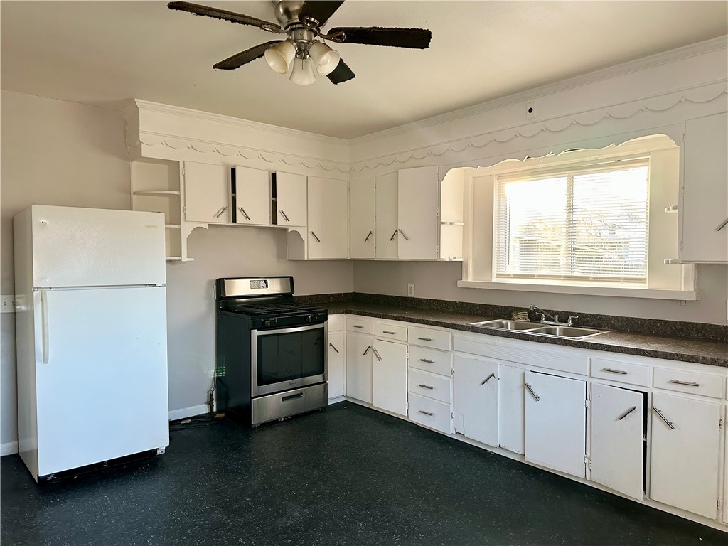 61 Myrtle Street Rochester, NY 14606 - Photo 9 of 18 Spacious Kitchen w/ 1st-Floor Laundry Hookups