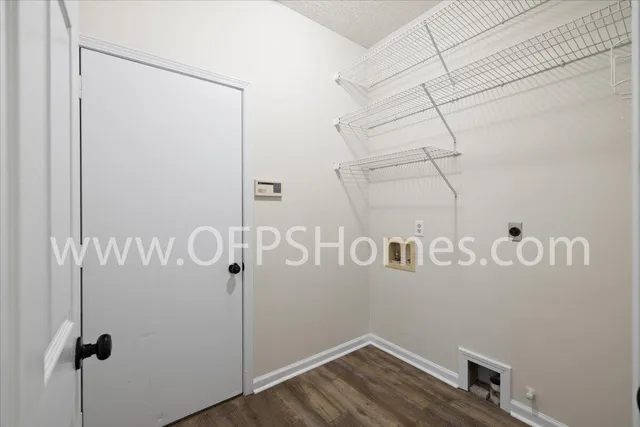 a view of a room with rack on the wall