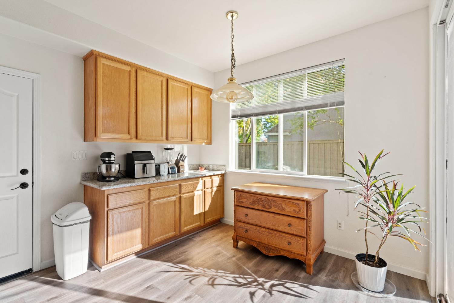 46 Bascom Court Sacramento, CA 95835 - Photo 11 of 34 a kitchen that has a sink and a stove in it