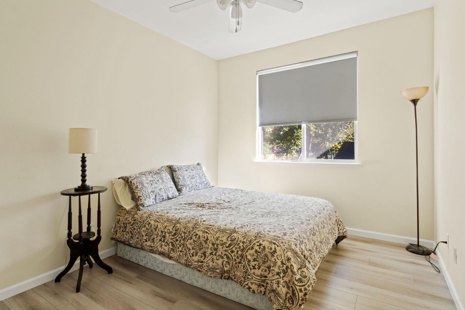 46 Bascom Court Sacramento, CA 95835 - Photo 18 of 34 a bedroom with a bed and a window