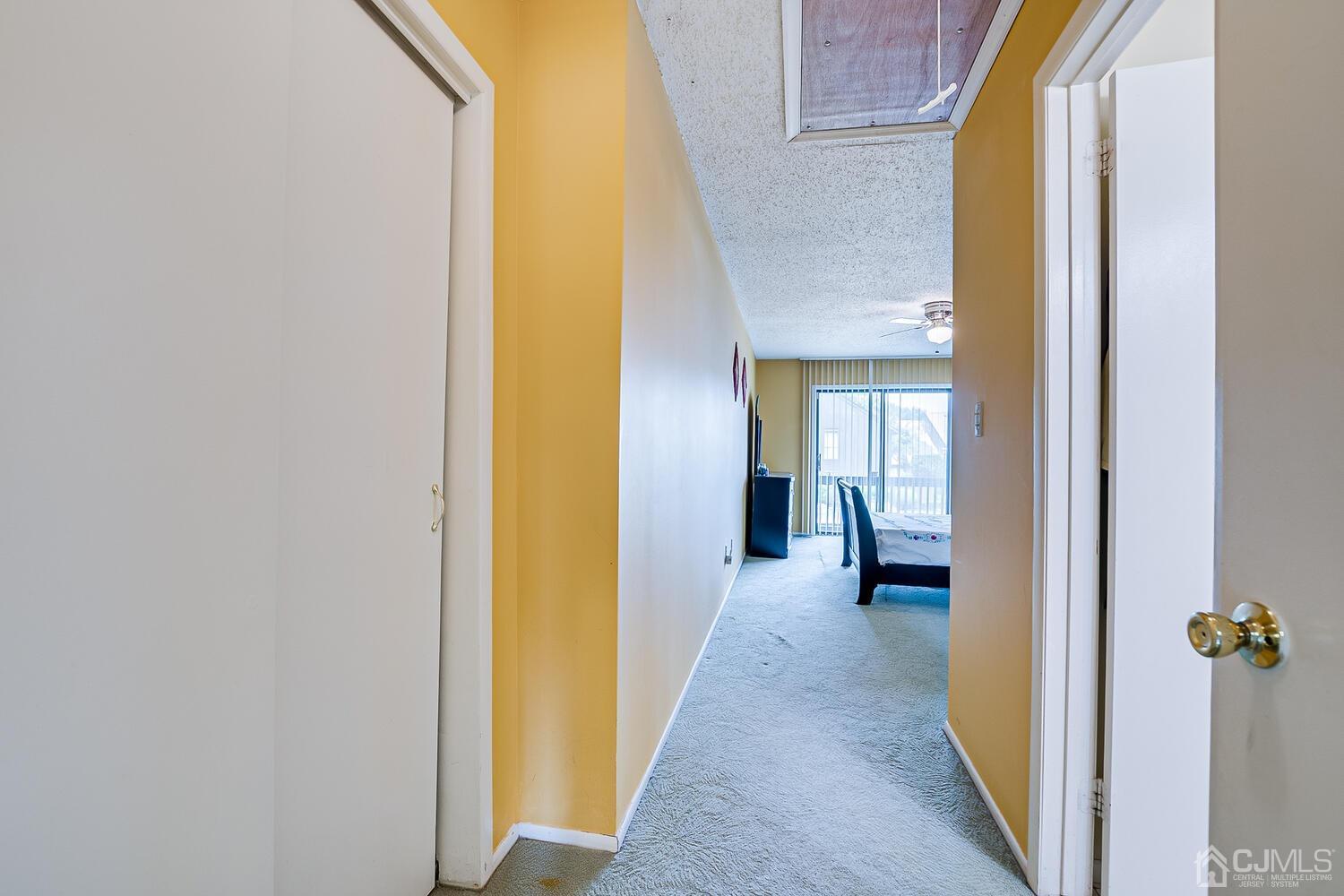 564 Westgate Drive Edison, NJ 08820 - Photo 18 of 37 a view of a bathroom from a hallway