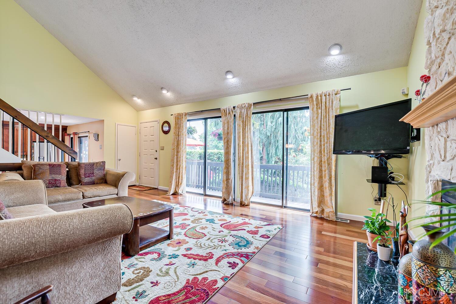 564 Westgate Drive Edison, NJ 08820 - Photo 3 of 37 a living room with furniture and a window