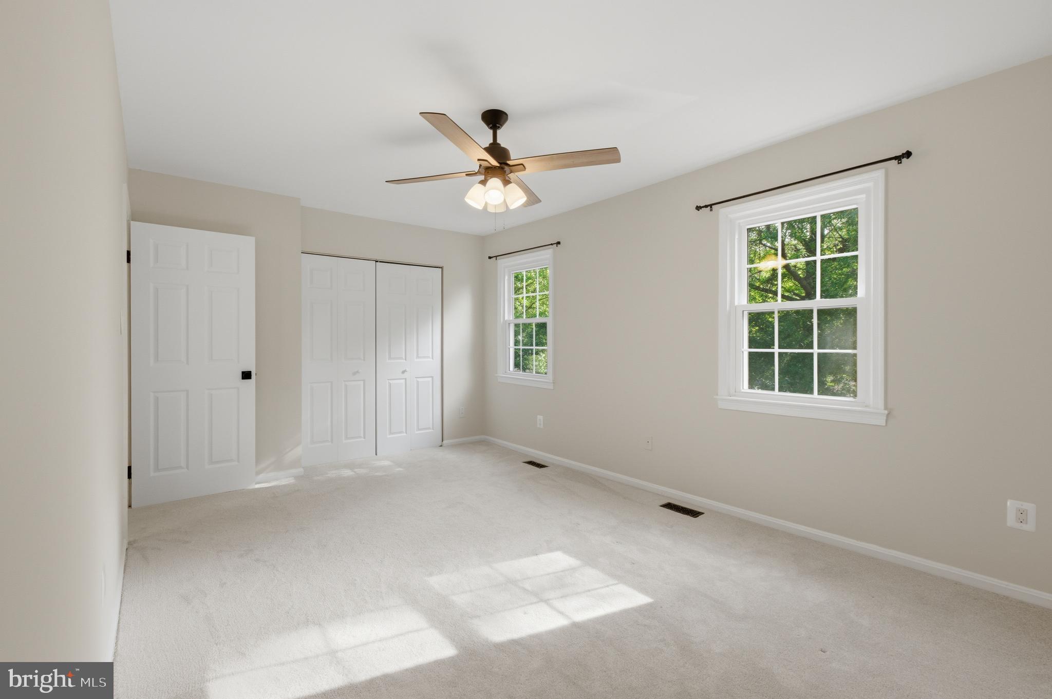 8575 Tyrolean Way Springfield, VA 22153 - Photo 15 of 29 a view of an empty room with a window