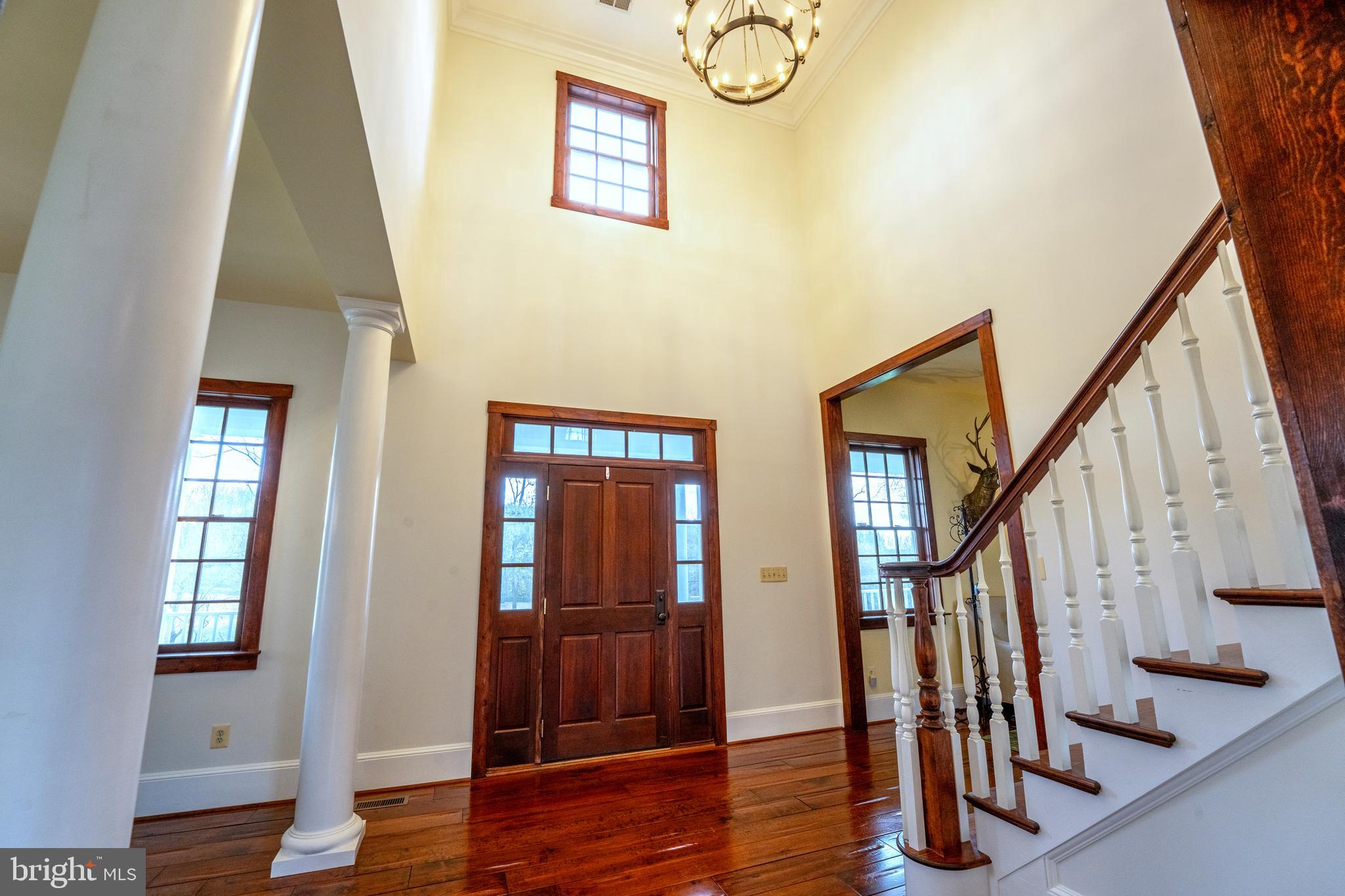 15718 Old Waterford Road Waterford, VA 20197 - Photo 13 of 81 a view of an entryway with wooden floor and stairs