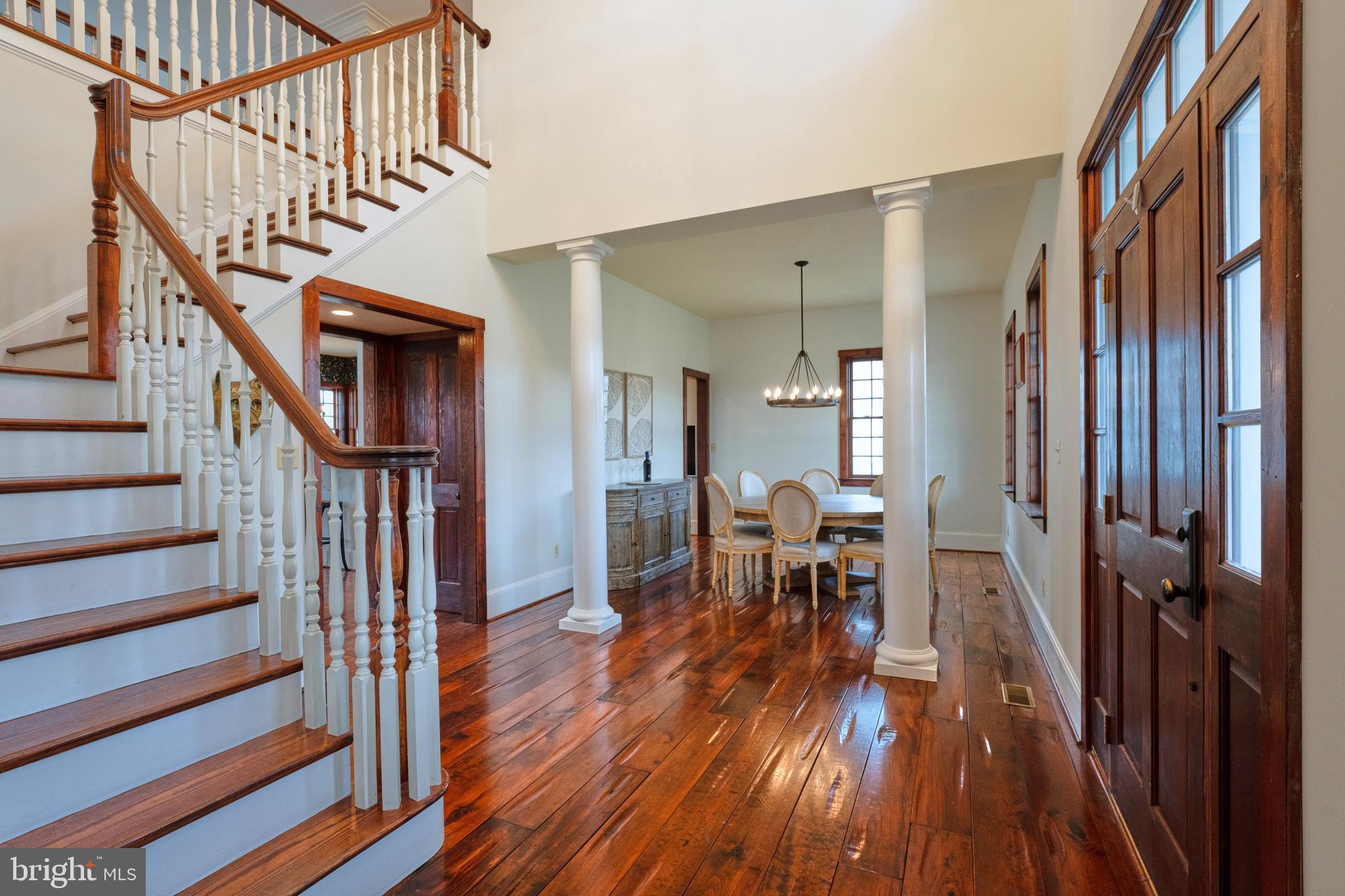 15718 Old Waterford Road Waterford, VA 20197 - Photo 14 of 81 a view of a hallway view with wooden floor and staircase