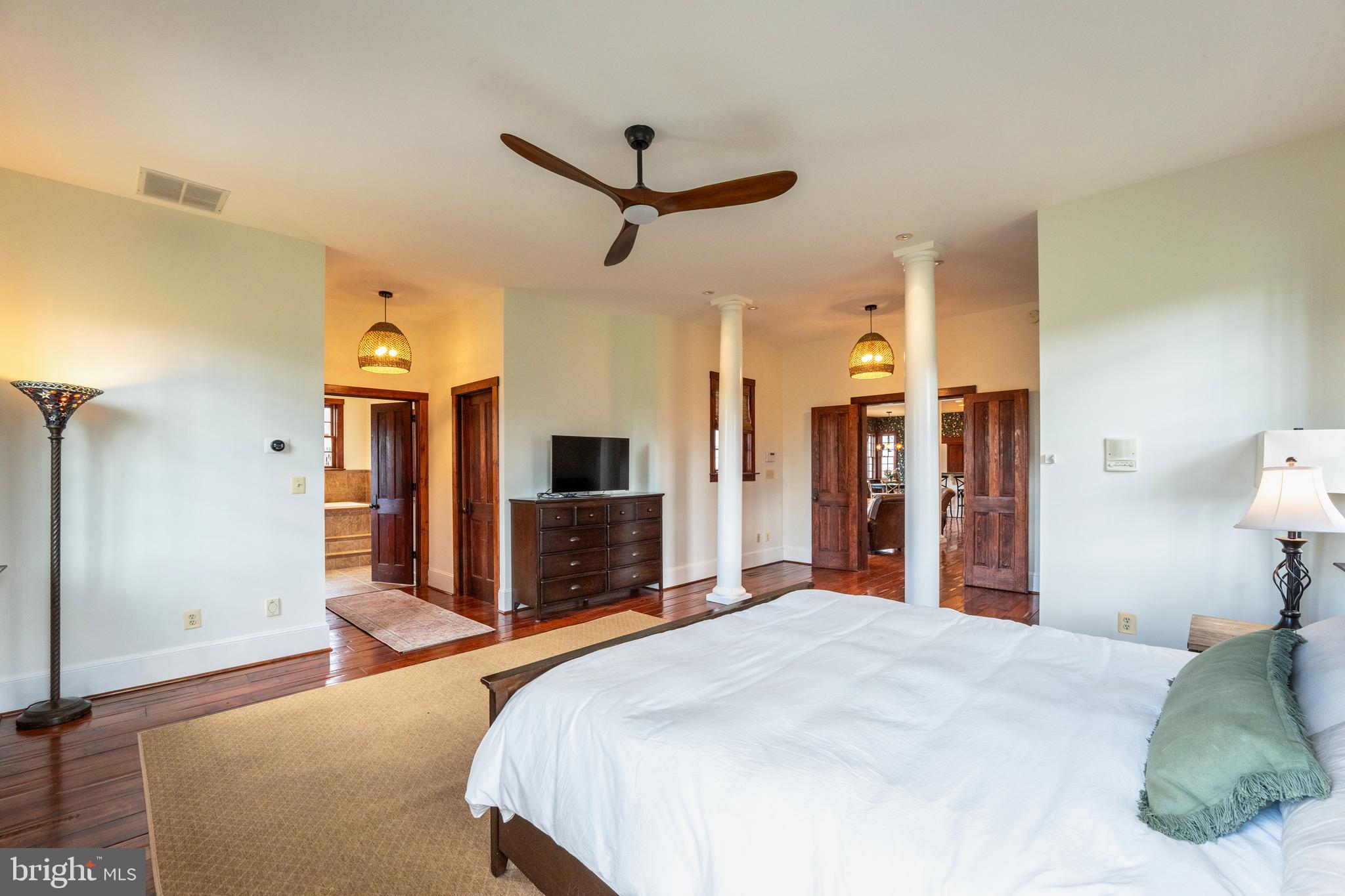 15718 Old Waterford Road Waterford, VA 20197 - Photo 34 of 81 a bed room with a bed and a tv