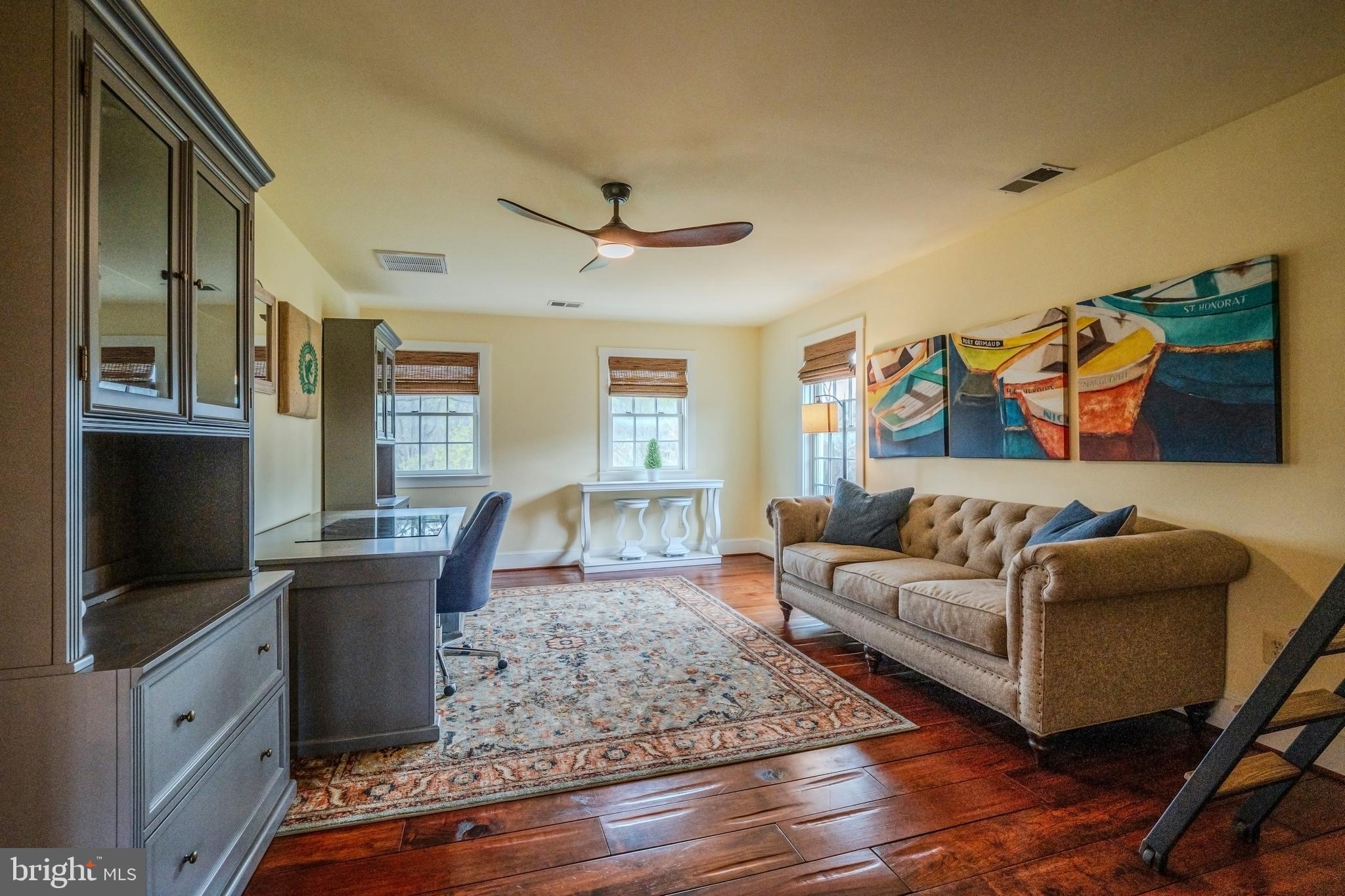 15718 Old Waterford Road Waterford, VA 20197 - Photo 41 of 81 a living room with furniture and a flat screen tv