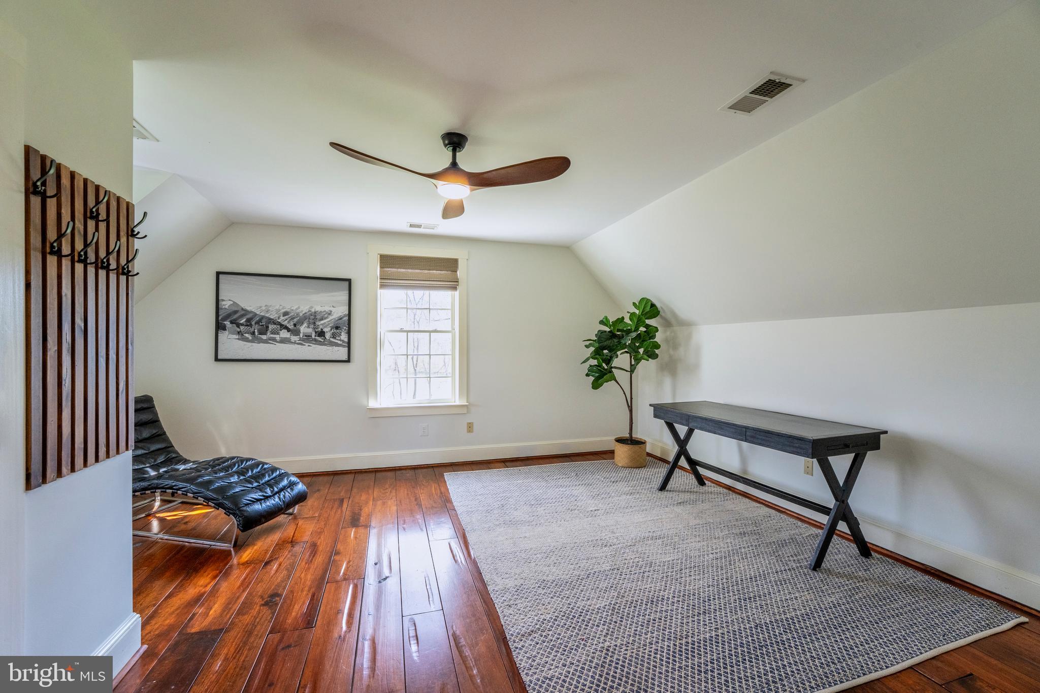 15718 Old Waterford Road Waterford, VA 20197 - Photo 47 of 81 a living room with furniture and a wooden floor