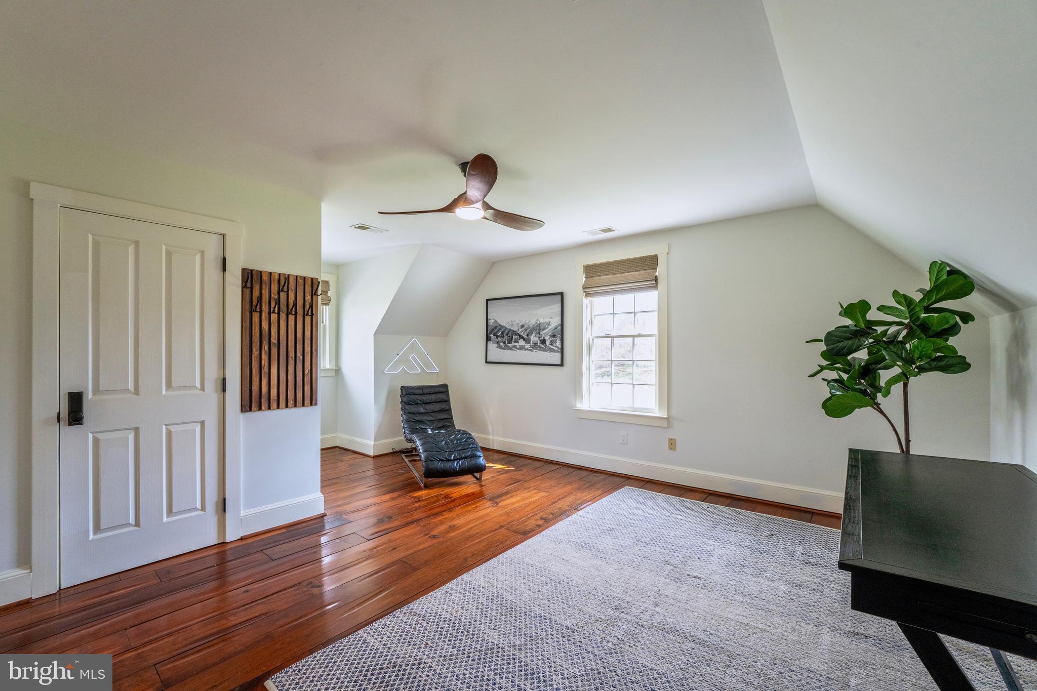 15718 Old Waterford Road Waterford, VA 20197 - Photo 48 of 81 a living room with furniture and a potted plant
