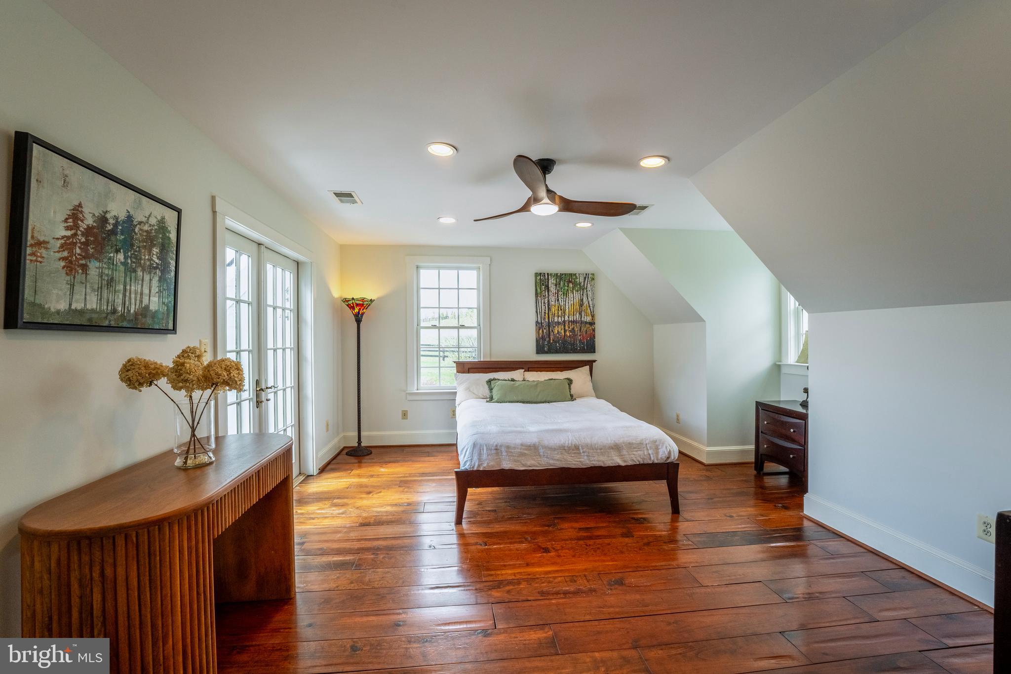 15718 Old Waterford Road Waterford, VA 20197 - Photo 50 of 81 a living room with furniture and a wooden floor