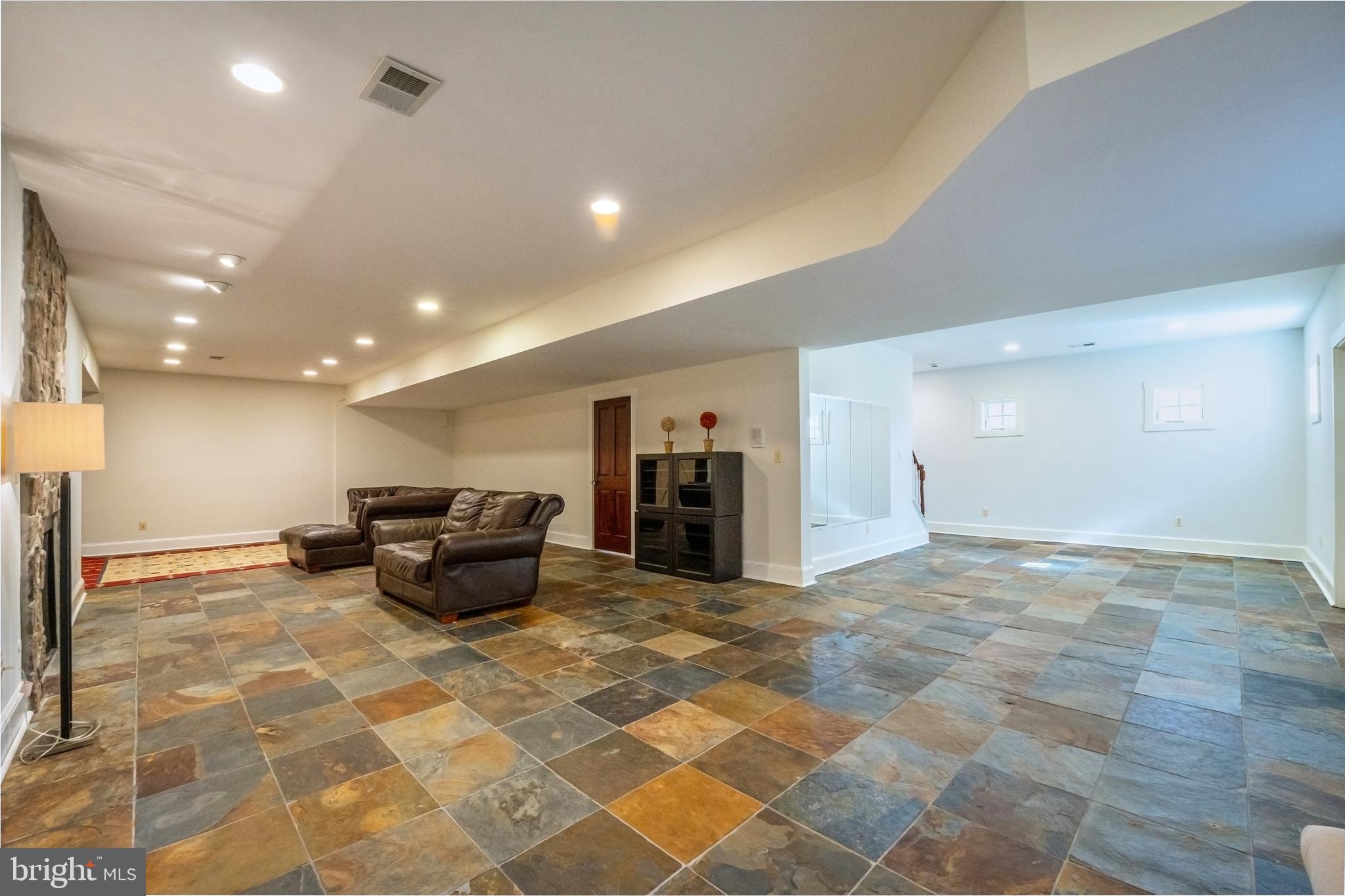 15718 Old Waterford Road Waterford, VA 20197 - Photo 60 of 81 a living room with furniture and a couch