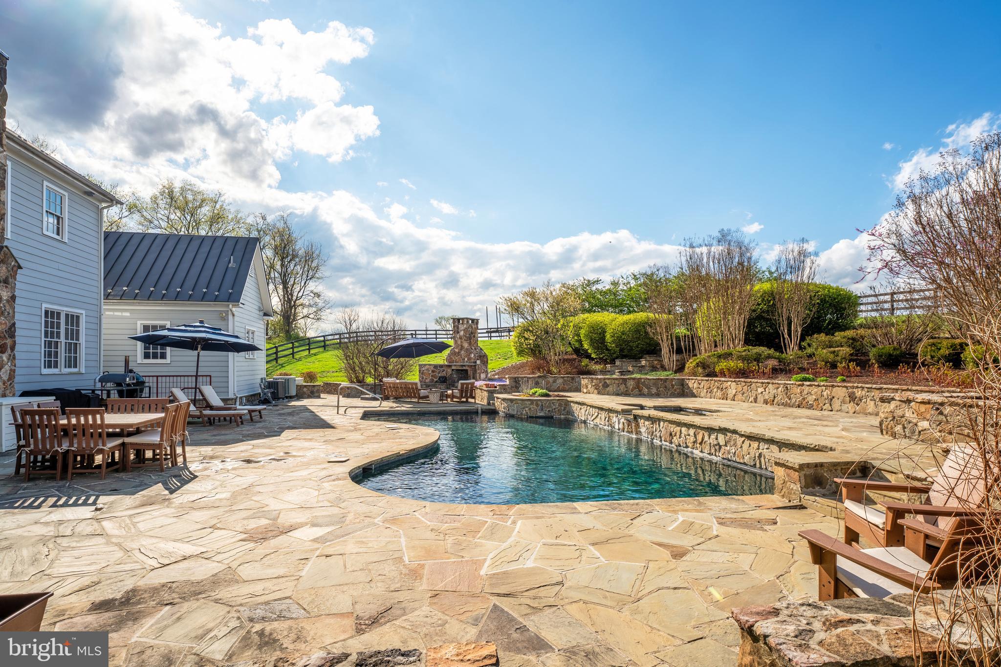 15718 Old Waterford Road Waterford, VA 20197 - Photo 63 of 81 a view of a swimming pool and lounge chair