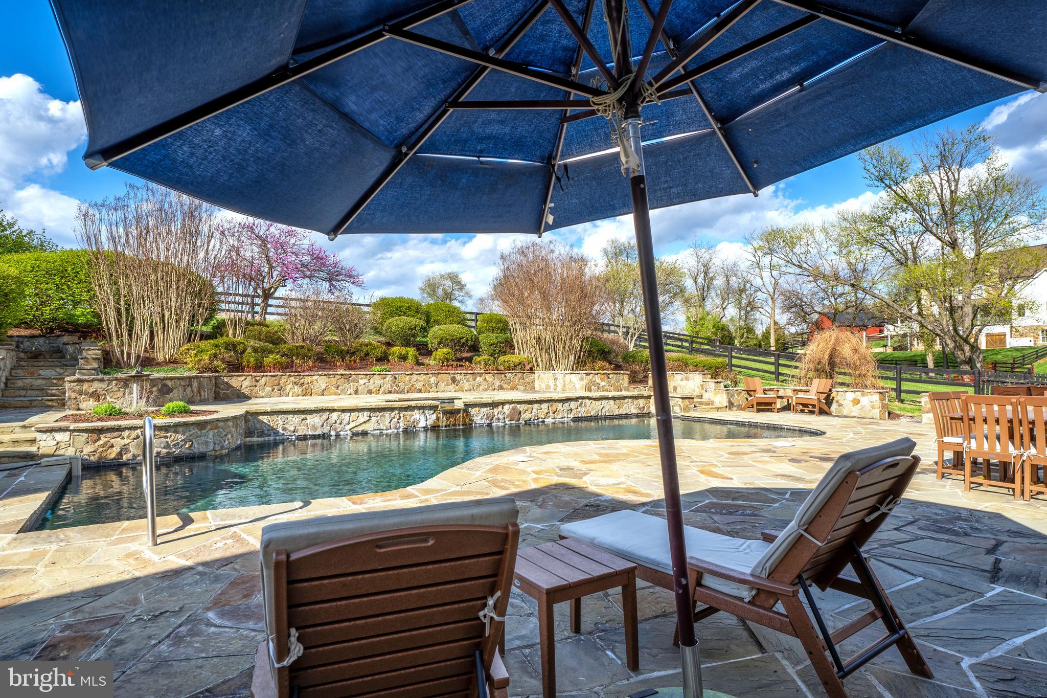 15718 Old Waterford Road Waterford, VA 20197 - Photo 64 of 81 a view of a swimming pool with a patio