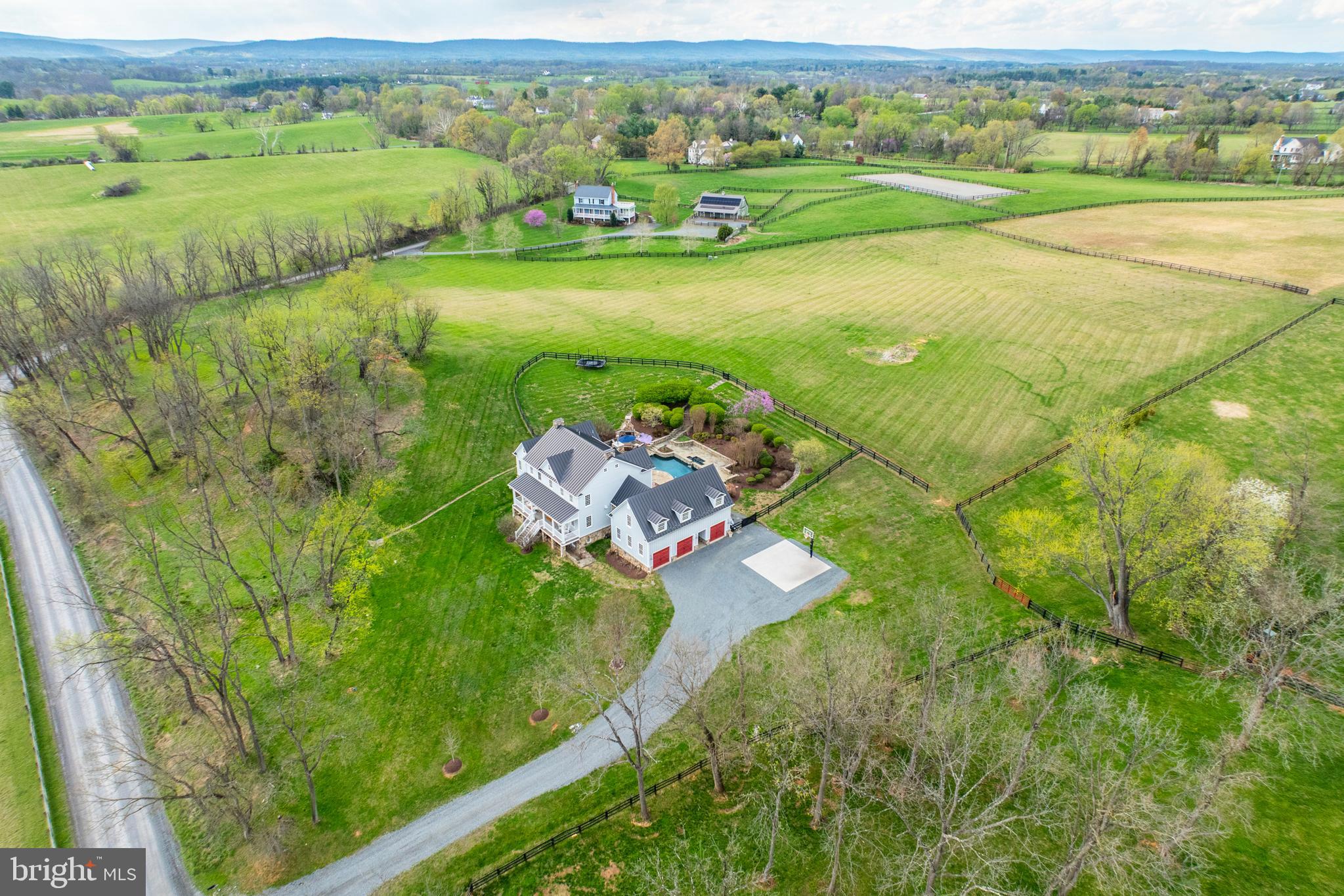 15718 Old Waterford Road Waterford, VA 20197 - Photo 70 of 81 an aerial view of a golf course with parking space