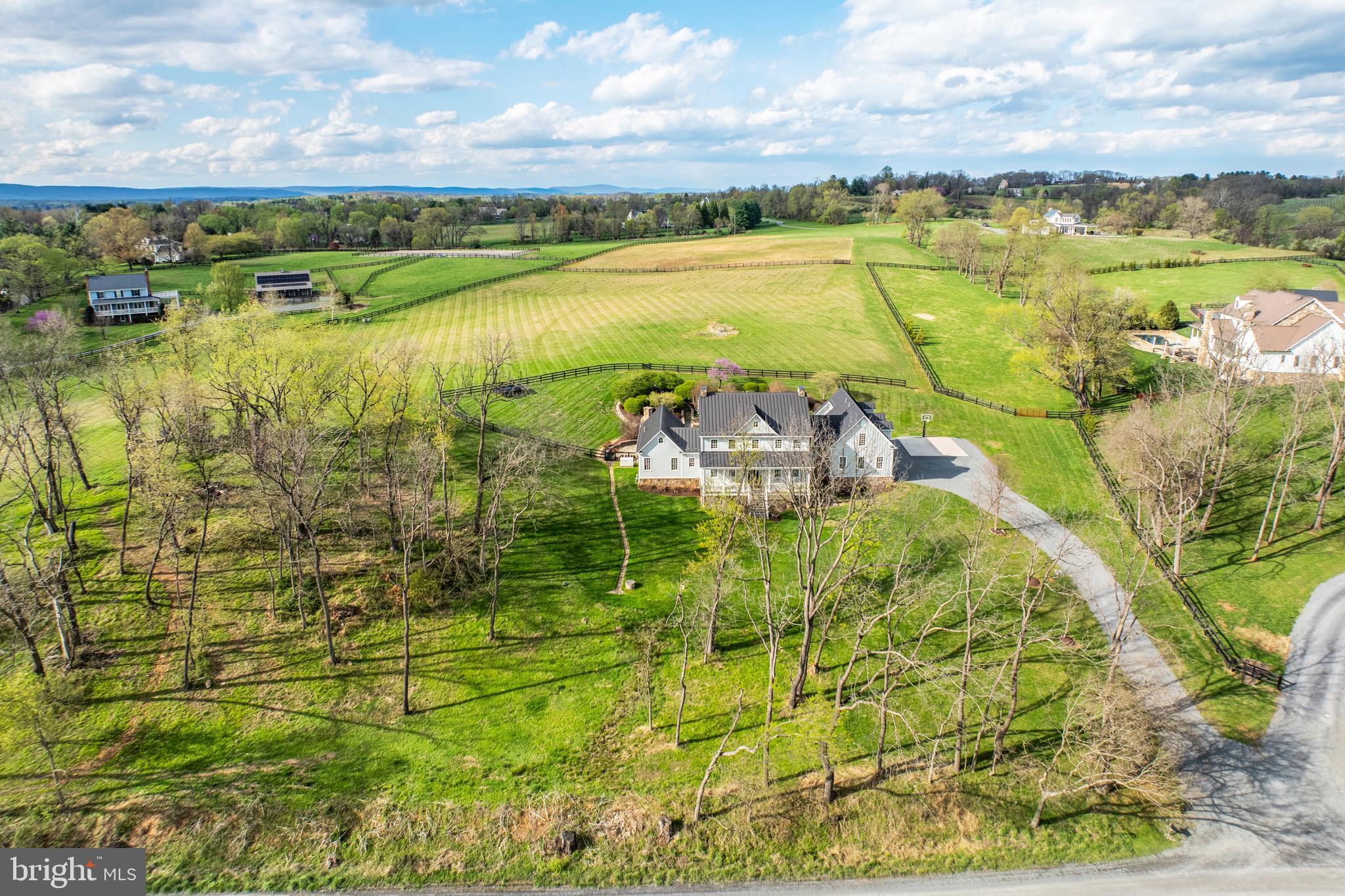 15718 Old Waterford Road Waterford, VA 20197 - Photo 72 of 81 a view of a lake with a houses