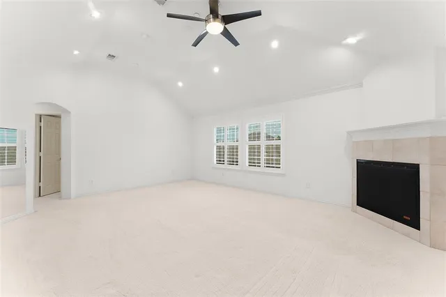 a bathroom with a double vanity sink mirror and shower