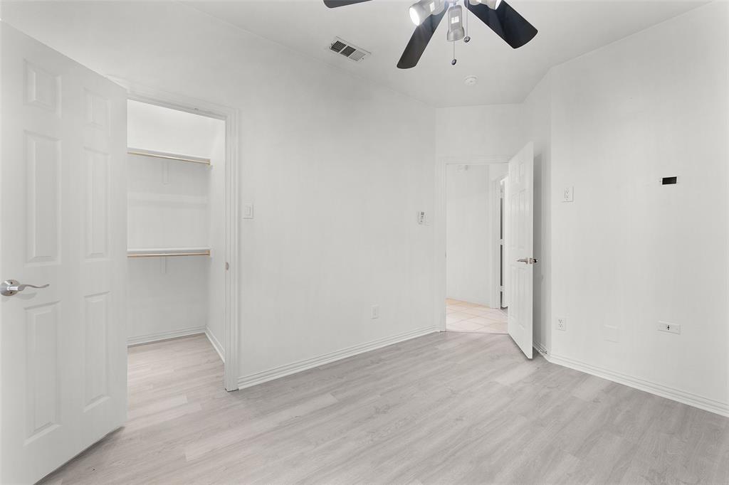8108 Locust Street Irving, TX 75063 - Photo 24 of 39 wooden floor in an empty room