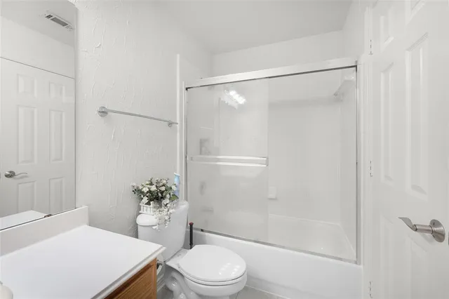 a utility room with washer and dryer