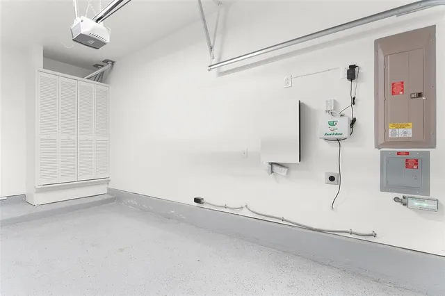 a view of a room with white walls