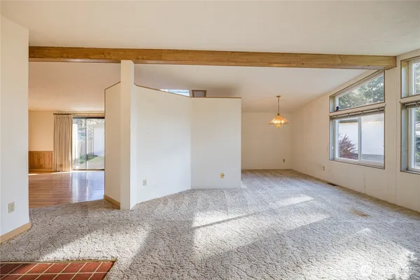 a view of an empty room and window