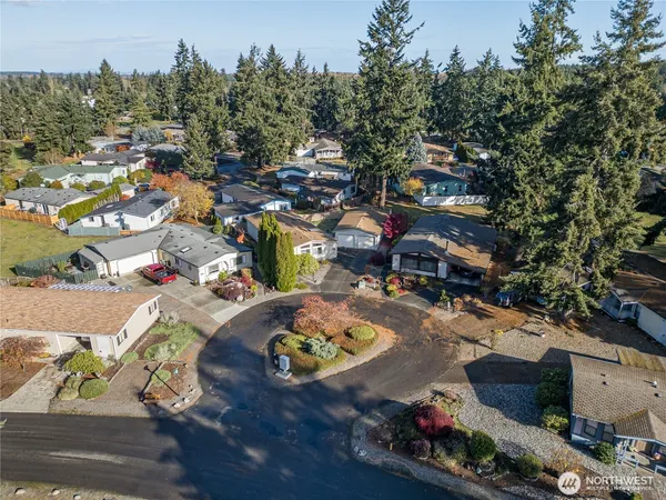 a view of a city with mountains in the background