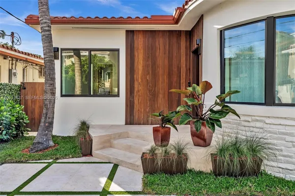 a view of a entryway door front of house