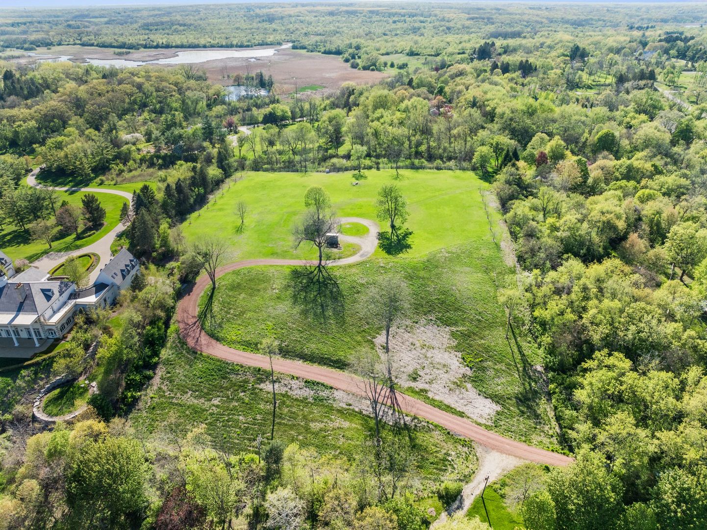 241 Otis Road Barrington Hills, IL 60010 - Photo 2 of 11 a view of a yard with plants
