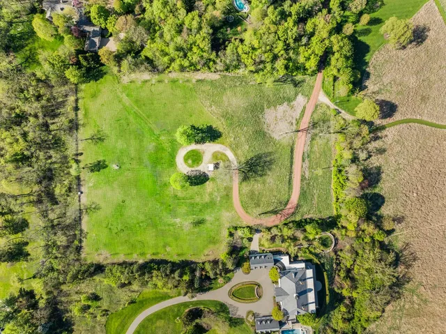 a bathroom with a sink mirror and vanity