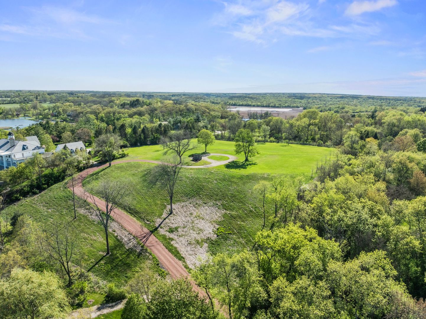241 Otis Road Barrington Hills, IL 60010 - Photo 9 of 11 an aerial view of residential houses with outdoor space and trees